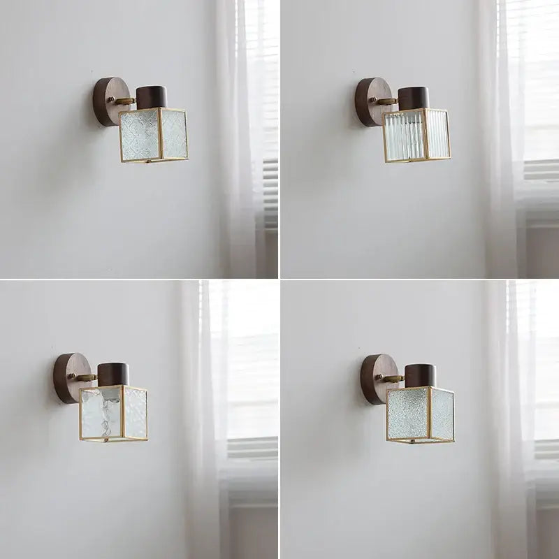 Rustic walnut wood and brass wall sconce with clear glass and dark wood mounting plate for bedroom lighting