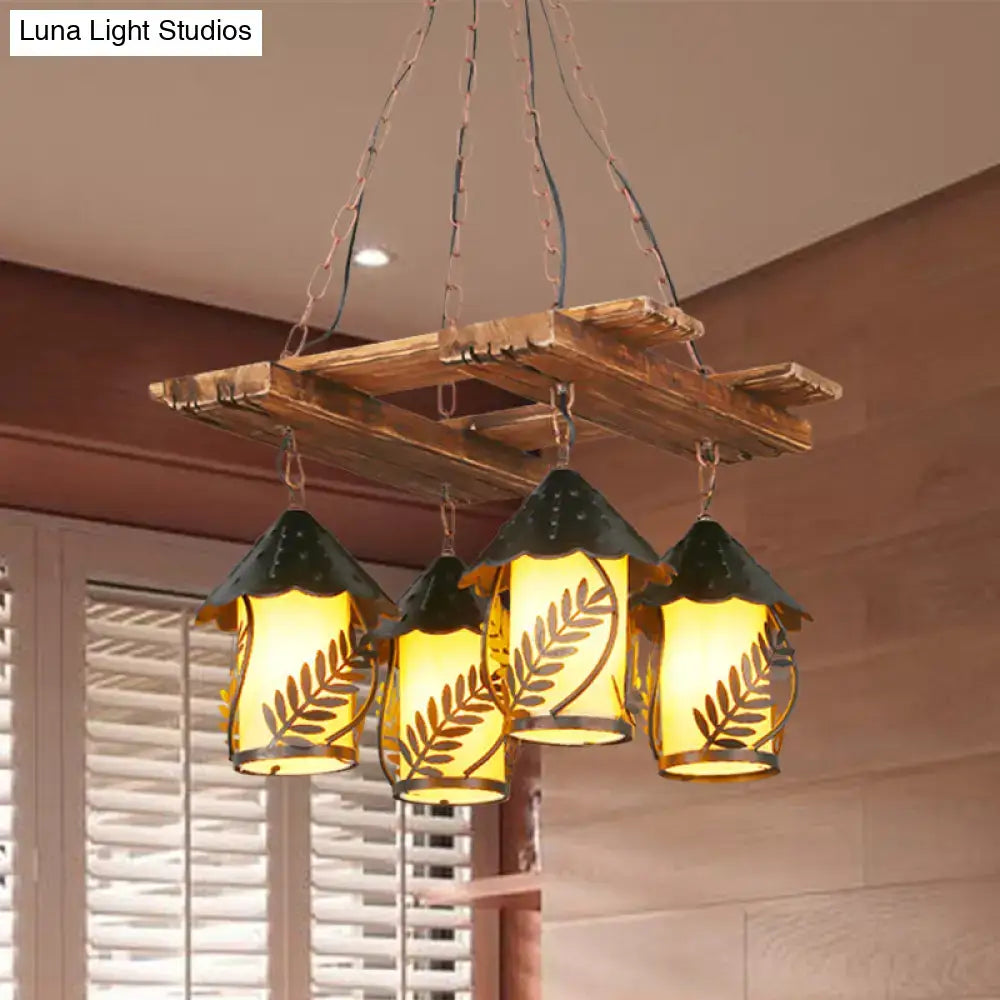 Rustic wooden pallet chandelier with amber glass shades, dark green metal tops, and metal arm for industrial decor