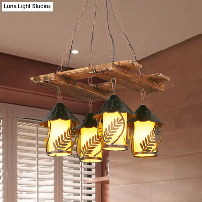 Rustic wooden pallet chandelier with amber glass shades, dark green metal tops, and metal arm for industrial decor