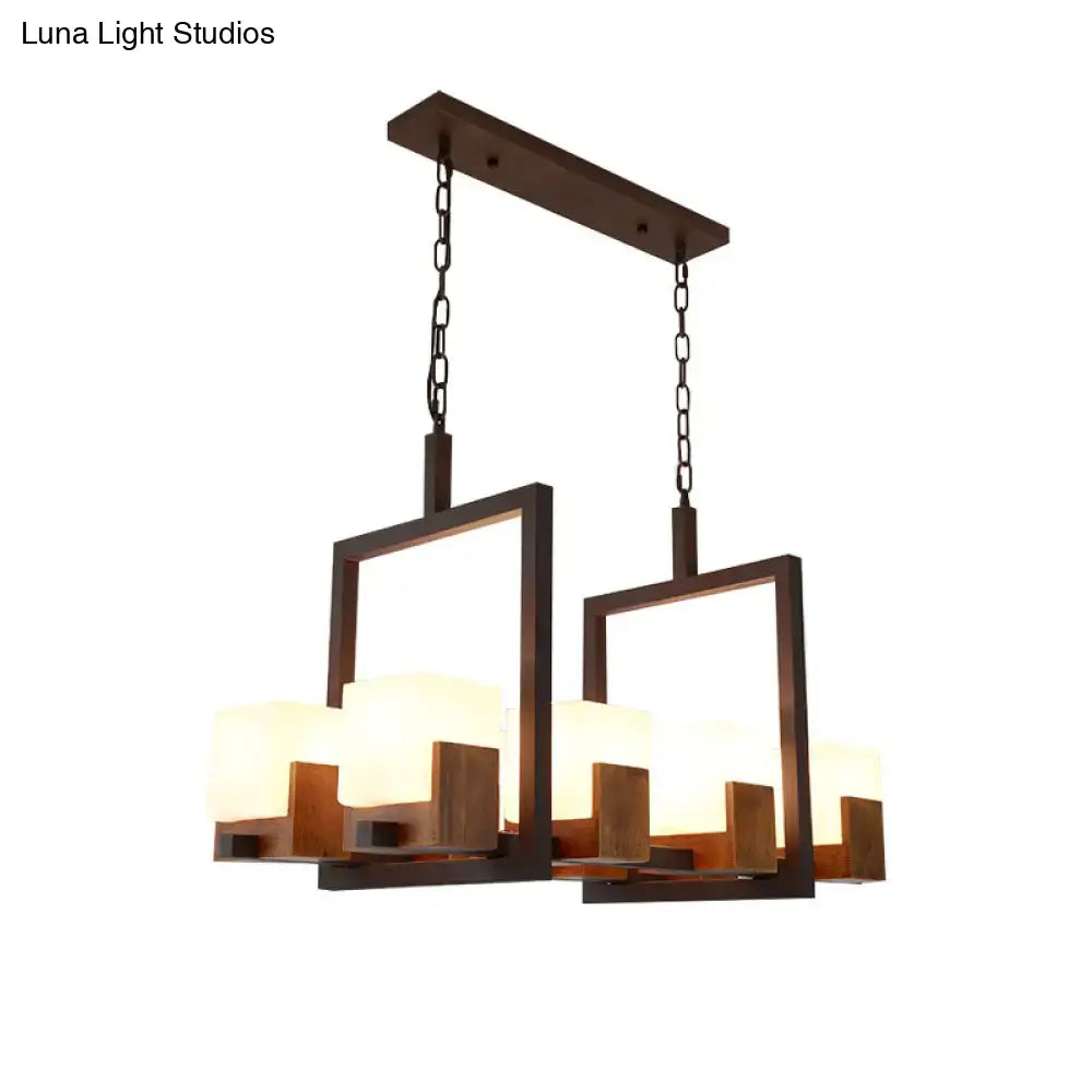 Modern rectangular restaurant island light with dark bronze frame, wooden accents, and rustic white glass shades for wine glasses