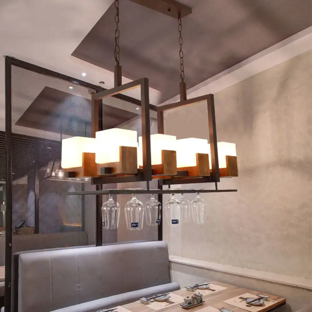Modern rectangular restaurant island light with rustic white glass, dark metal frame, wooden accents, and wine glasses feature