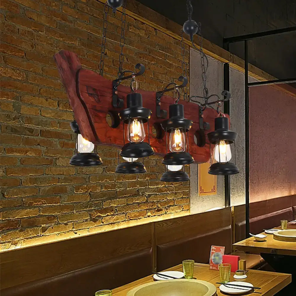 Decorbites farmhouse brown lantern pendant lamp with clear glass and black metal frames suspended from red wood beam