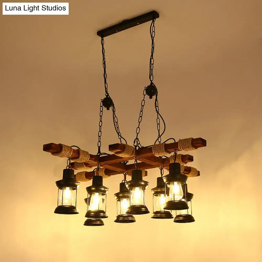 Rustic farmhouse brown lantern pendant lamp with black metal lanterns rope accents and clear glass wood arms