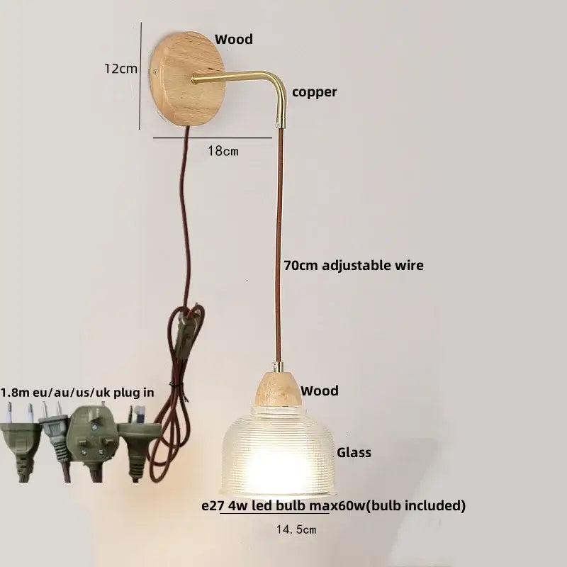 Rustic wood and brass wall light with warm copper tones, ribbed clear glass shade, and pull chain switch