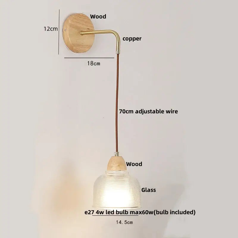 Rustic wood and brass wall light with natural wood base, copper arm, ribbed clear glass shade, and pull chain switch