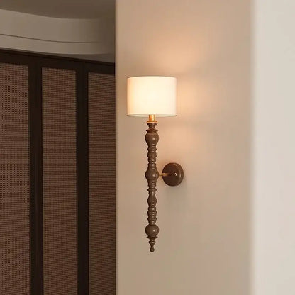 A rustic warm-toned led wood wall light with dark bronze finish and cream fabric shade for living room decorbites led wood