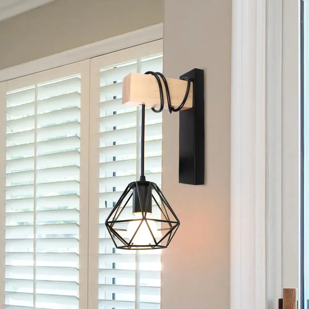 Black geometric wall sconce with wooden accent and coiled cord by decorbites loft american iron for bedroom decor