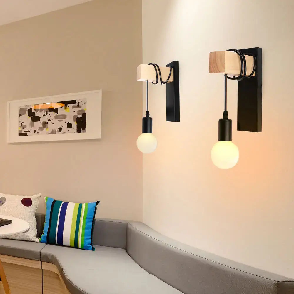 Rustic wood and iron wall sconce with black and light wood finish exposed cords and frosted bulbs from decorbites loft american