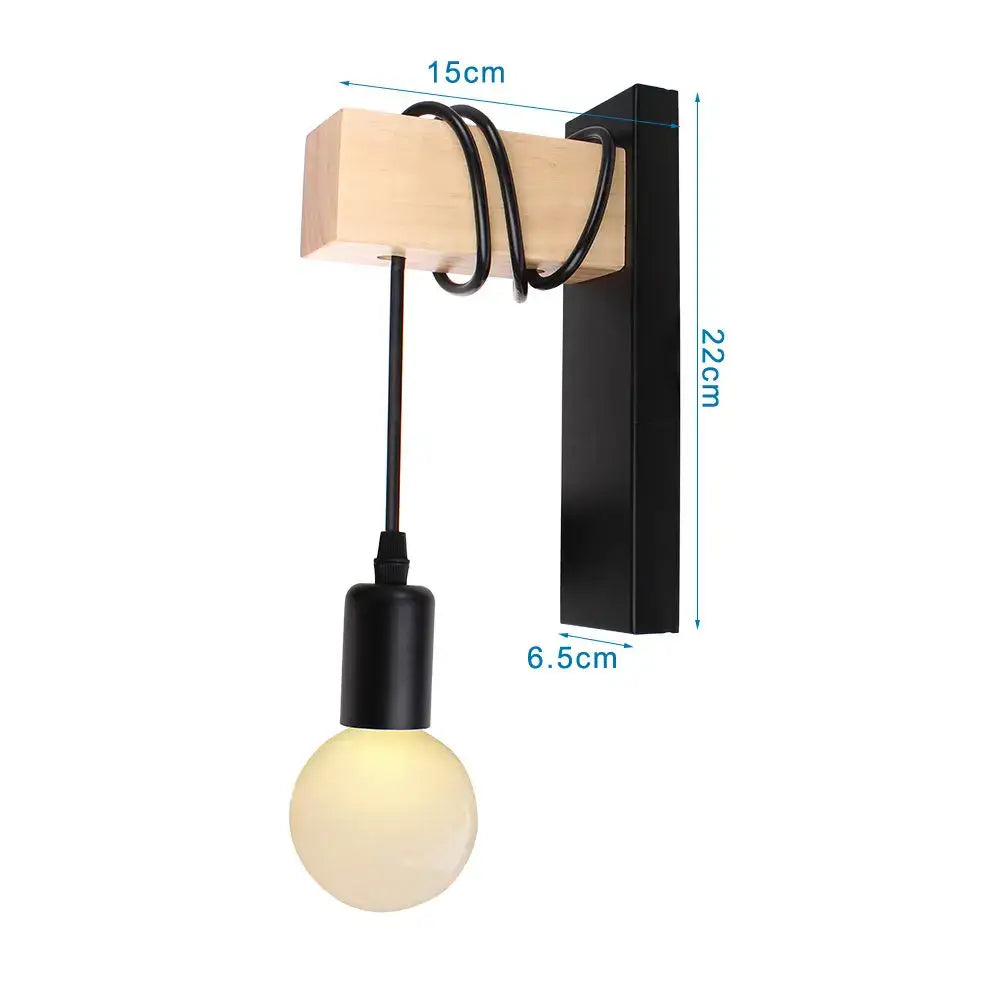 Minimalist wall sconce with black metal bracket wooden block coiled cord and exposed bulb for loft american iron decorbites decor