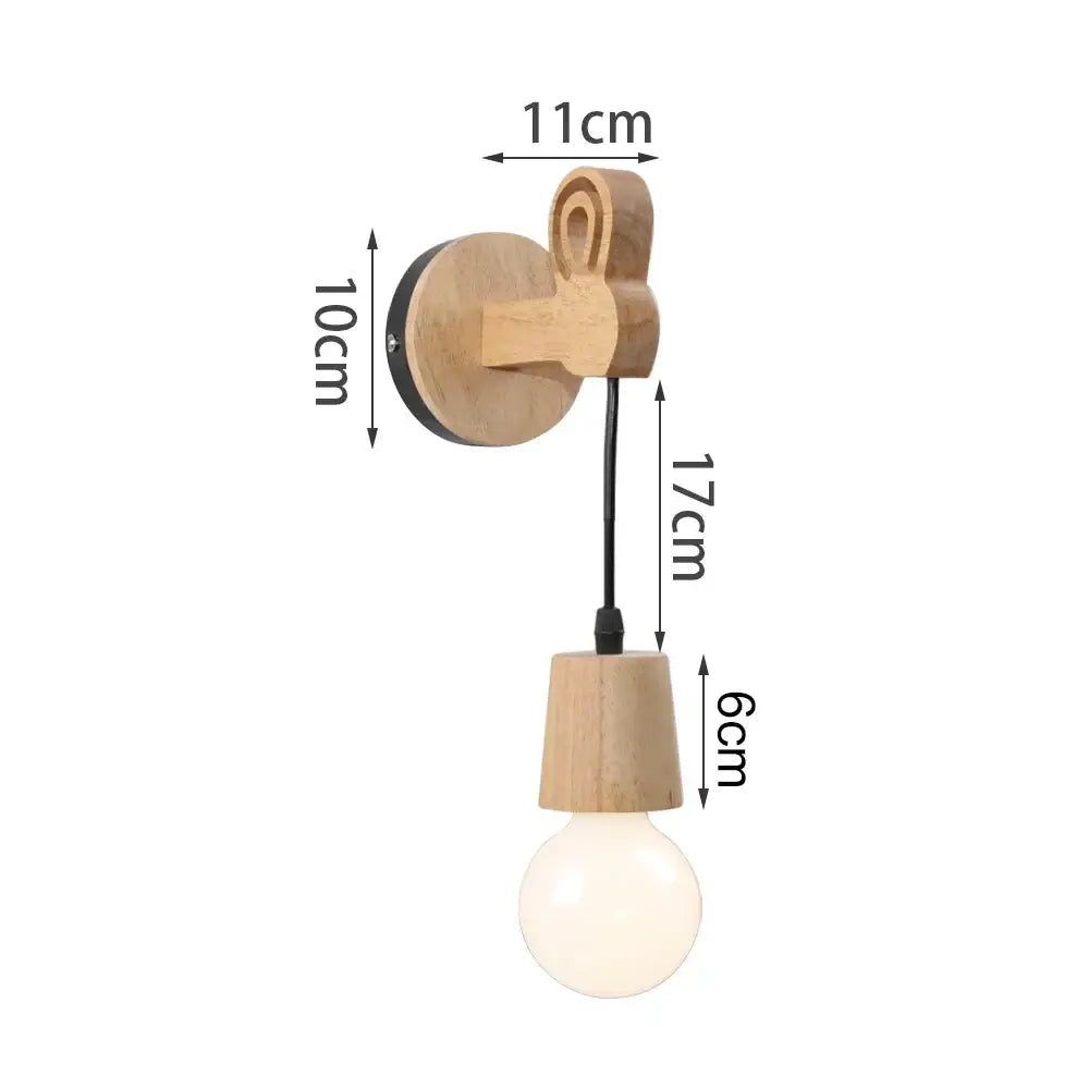 Rustic wood and iron wall sconce with natural finish hanging cylindrical shade and exposed bulb by decorbites loft american