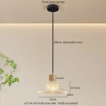 Rustic wood and ribbed glass led pendant light with black iron canopy and clear textured glass shade for dining room