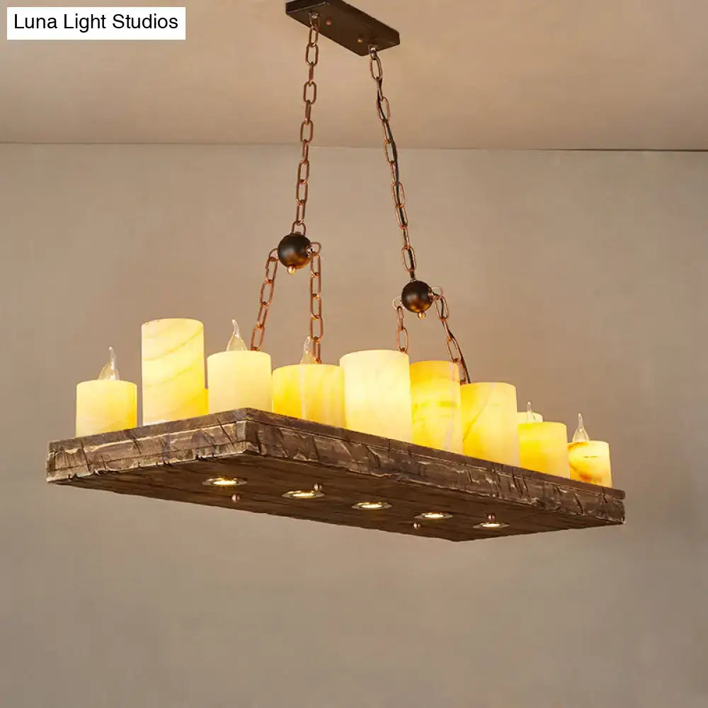 Rustic brown wood candelabra pendant light with multiple warm candle-like lights for dining room island hanging
