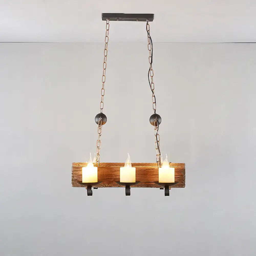 Rustic decorbites brown wood candelabra pendant light with three glowing candle-style bulbs for dining room use