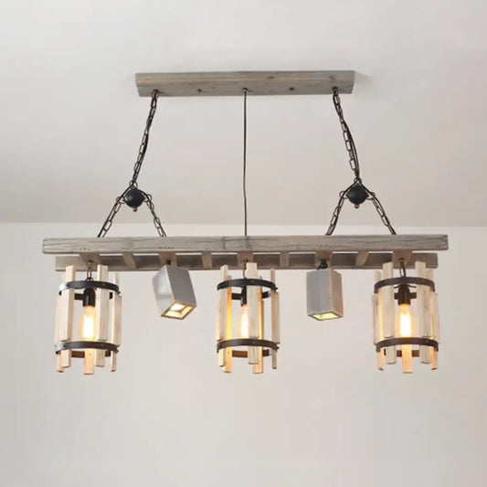 Rustic wooden ceiling light with three glass shades and concrete fixtures suspended by black metal chains
