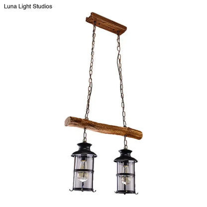 Rustic wooden beam pendant light with two black lanterns and clear glass in decorbites wood design brown island lighting