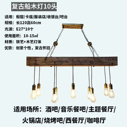 Vintage rustic wood hanging chandelier with ten brass edison bulbs suspended by iron chains for bar hanging lighting