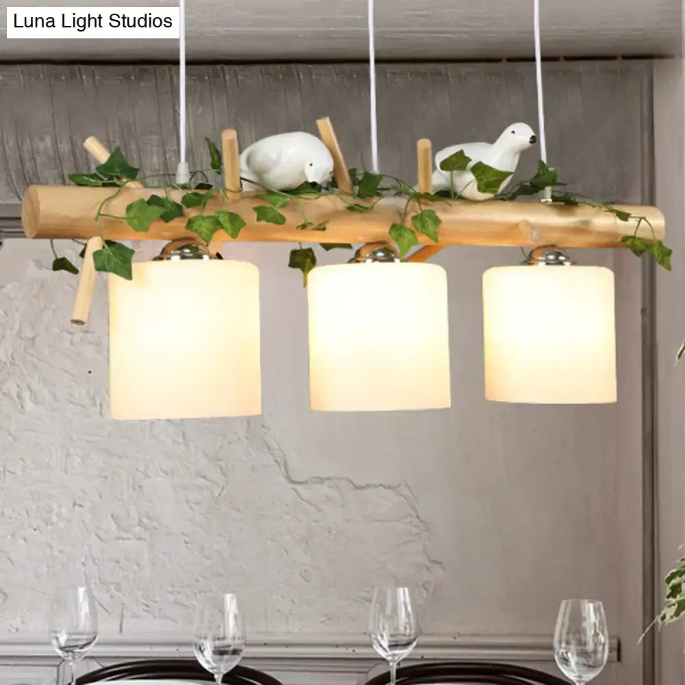 Decorbites modern wood linear island lighting features natural wood with cream glass shades and white ceramic bird ornaments, ideal for restaurants incorporating maple leaf plant motifs