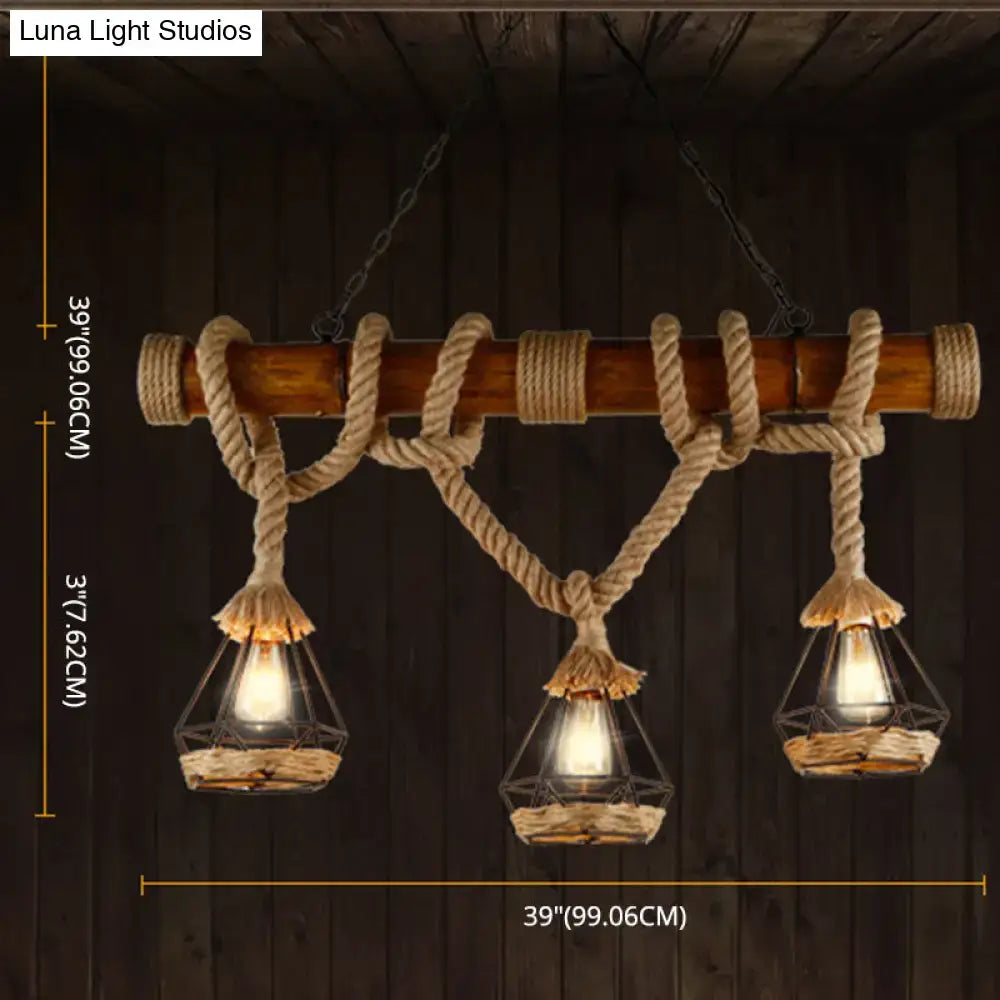 Rustic wooden beam pendant light with thick beige rope wrapping and three geometric glass lanterns for kitchen island