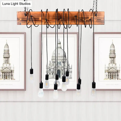Rustic wooden beam pendant light with black antique brass metal chains and clear edison bulbs in multi light chandelier design