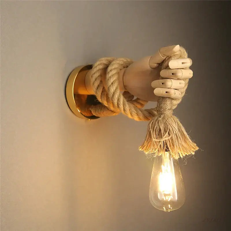 Rustic wooden hand shape hemp rope wall light with beige rope and exposed filament bulb for restaurant corridor