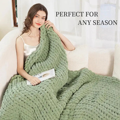 A sage green chunky knit cozy autumn fleece blanket with a soft textured pattern perfect for decorbites cozy autumn use