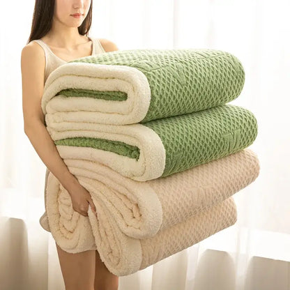 Stacked sage green and cream plush blankets with textured knit and cozy warmth velvet fleece lining for autumn decorbites cozy warmth