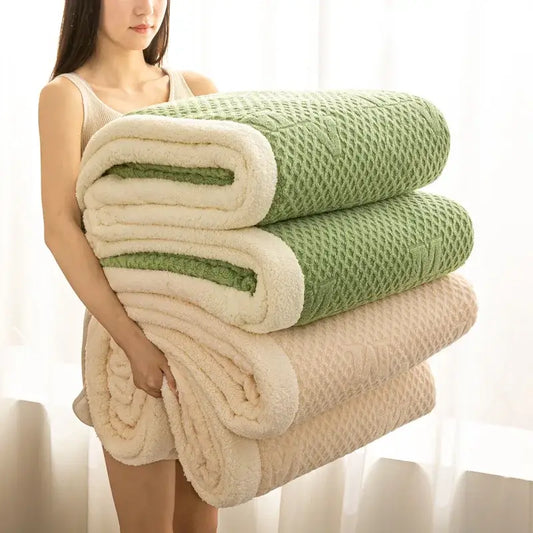 Stacked sage green and cream plush blankets with textured knit and cozy warmth velvet fleece lining for autumn decorbites cozy warmth