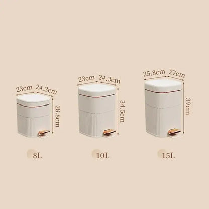 Three white pedal trash cans with gold accents and vertical ribbed sides for decorbites light luxury kitchen use