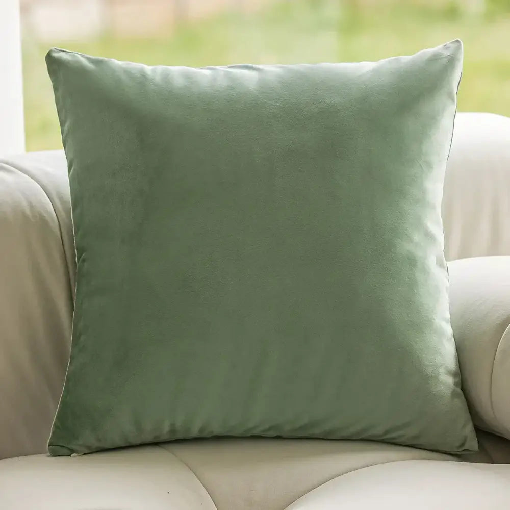 A soft sage green velvet throw pillow with plush textured surface perfect for decorbites green plant jacquard pillow covers