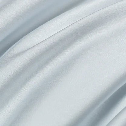 Soft pale blue satin bedding set with solid color design and decorbites cool touch for smooth glossy finish