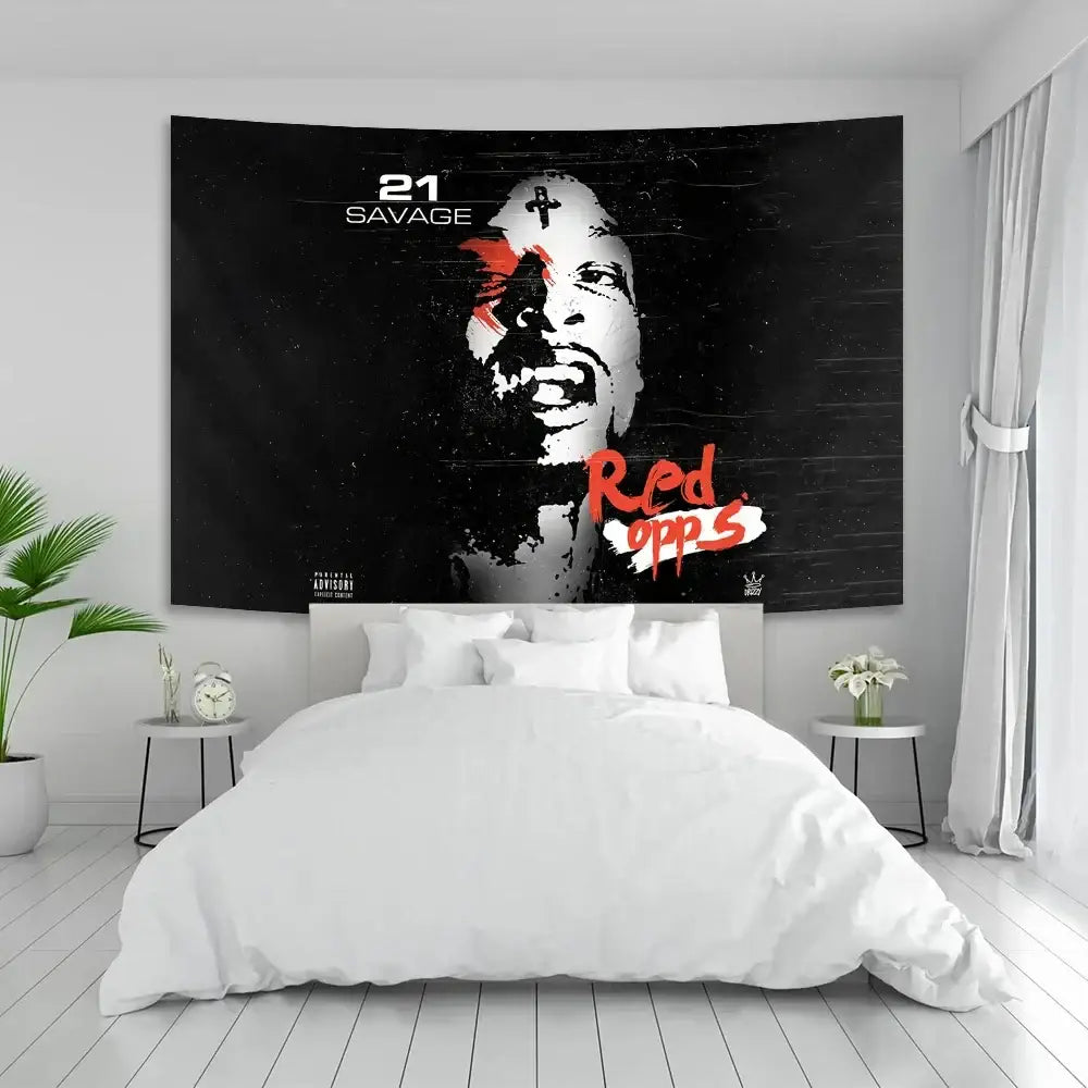 Black and red savage tapestry pop featuring 21 savage album cover hung above white bed for bedroom wall decor