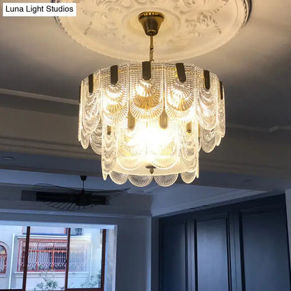 Elegant DecorBites scalloped clear textured glass drop lamp with gold-toned brass accents for classic dining rooms