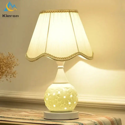 Scalloped cream ceramic led desk lamp with floral embossed design and gold trim for decorbites ceramic led decor