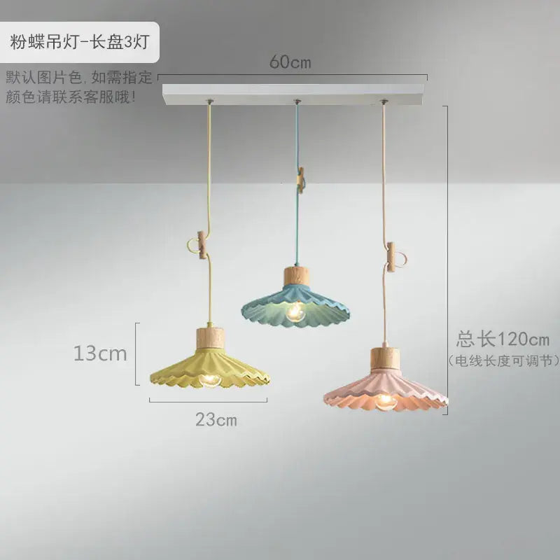Scalloped pastel led pendant lights shaped like butterflies with wooden accents and adjustable cords for dining room