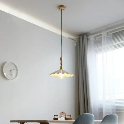 A cream scalloped ceramic led pendant light with dark cord and wooden fixture for bedroom decorbites ceramic led pendant