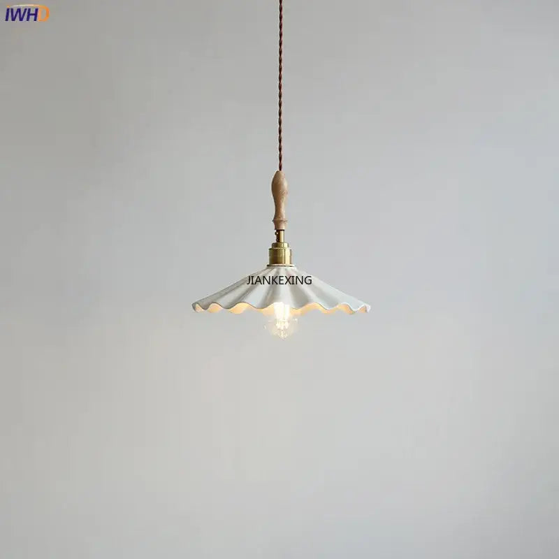 Scalloped white ceramic led pendant light with brass hardware and wooden handle for dining room by decorbites ceramic led pendant