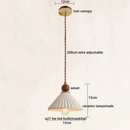 Scalloped white ceramic wood pendant lamp with fluted design hanging from adjustable wire by wooden bead decorbites ceramic wood