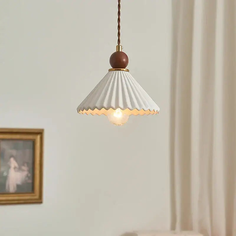 Scalloped white ceramic wood pendant lamp with fluted design and warm wooden sphere accent for dining room decorbites ceramic wood led