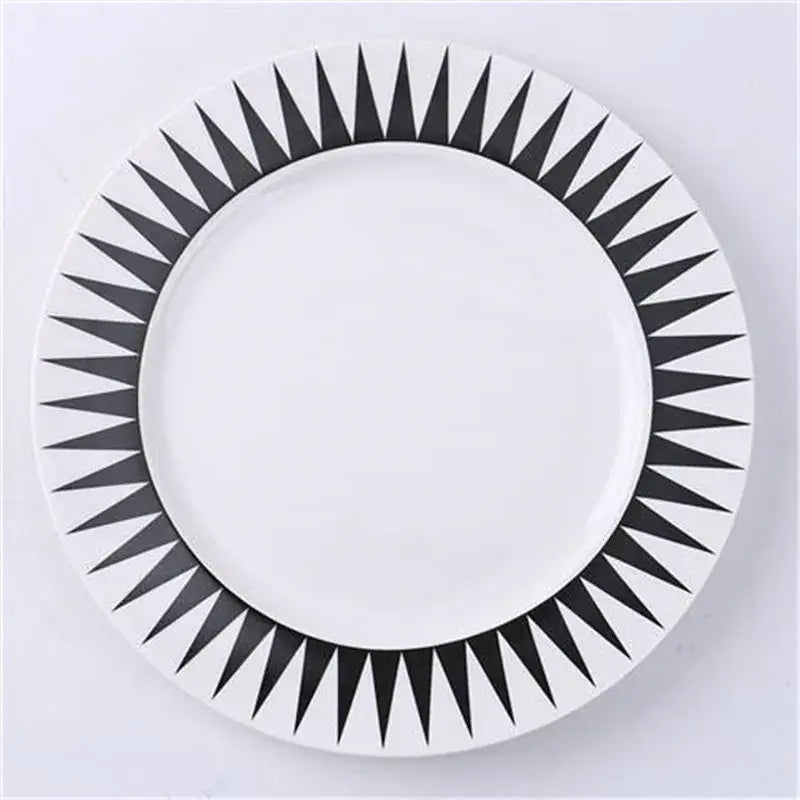White ceramic dessert plates with bold black geometric sunburst rim pattern decorbites ceramic dessert plates
