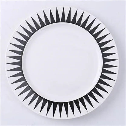 White ceramic dessert plates with bold black geometric sunburst rim pattern decorbites ceramic dessert plates