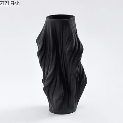 Black ceramic vase with sculpted flowing ribbed texture for bedroom decorbites ceramic vase collection