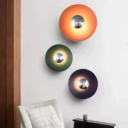 Three decorbites colorful round metal led wall lamps with gradient orange green and dark purple shades for bedroom