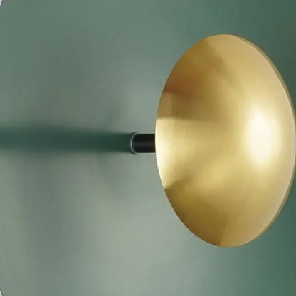 Gold-colored matte dome wall lamp with sleek black stem from set of 5 decorbites colorful round metal led wall lamps