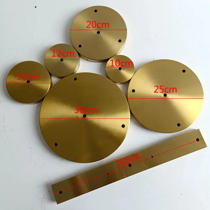 Set of 6 brushed brass ceiling plate lamp bases with circular and rectangular drill holes in varying sizes for diy use