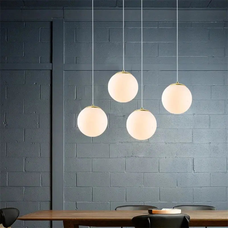 Set of six decorbites glass ball pendant lights with frosted glass and gold fixtures for living room decor