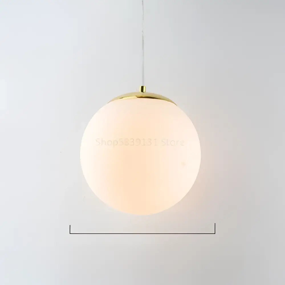 Set of 6 warm frosted glass ball pendant lights with gold-toned metal fixture for living room decorbites glass ball pendant