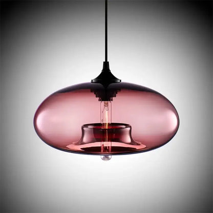 A sleek oval translucent rose glass pendant light with an exposed filament bulb from decorbites colorful glass pendant set