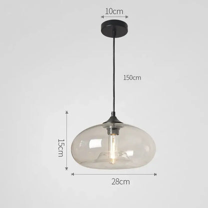 A modern pendant light with frosted glass globe black metal hardware and exposed filament bulb from decorbites colorful glass pendant set