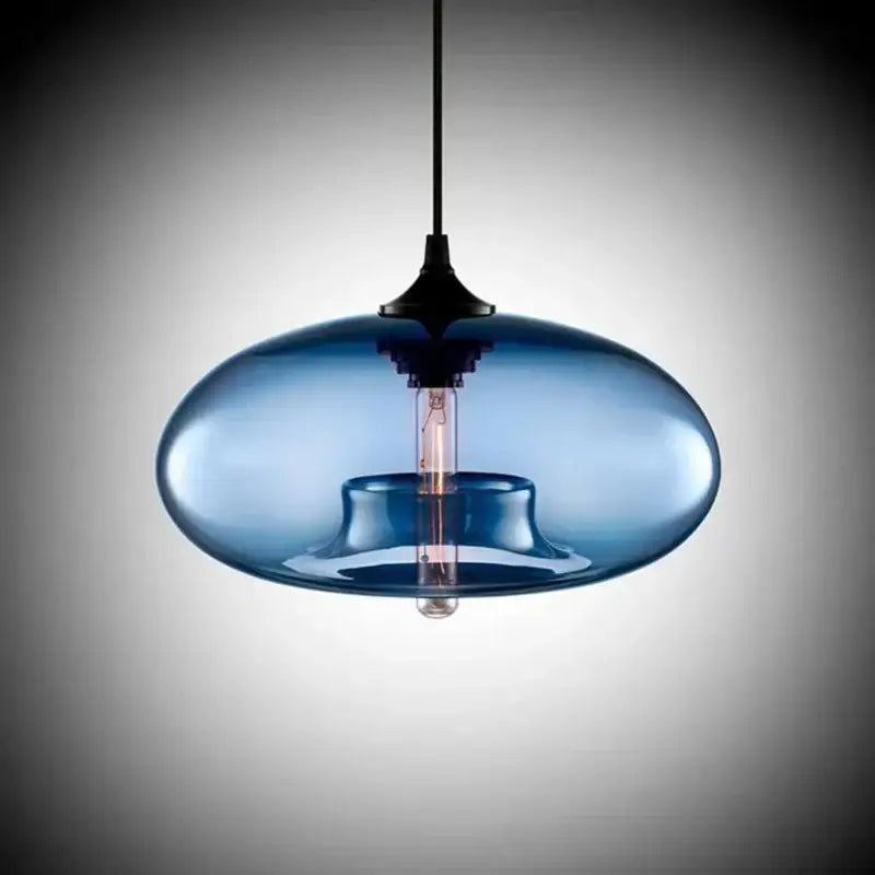 Sleek modern pendant light with translucent blue glass shade and exposed filament bulb from decorbites colorful glass pendant set