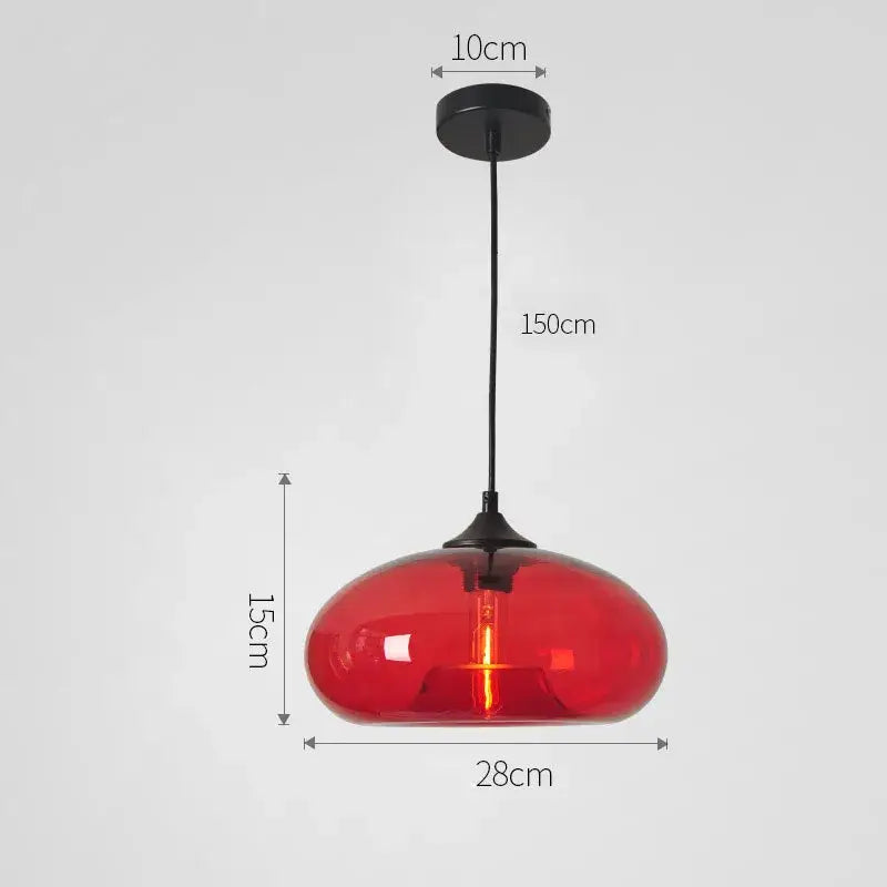 A vibrant red translucent glass pendant light with sleek black metal fixture from decorbites colorful glass pendant set